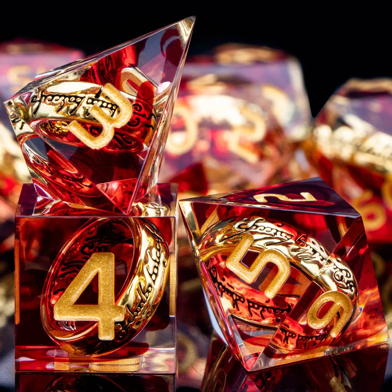 Transparent red dice with gold numbers and gold rings inside