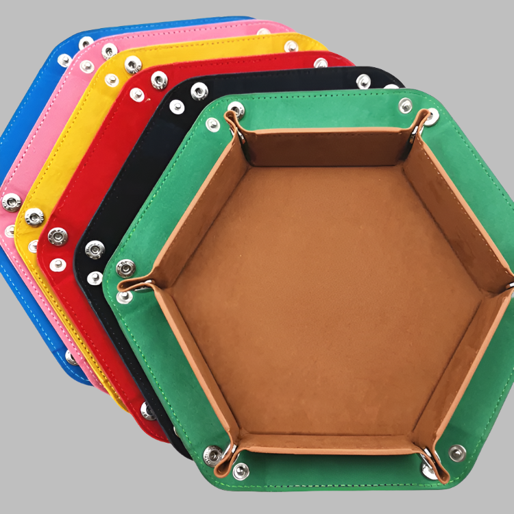 Set of foldable dice trays of different colors